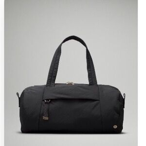 Lululemon On My Level Barrel Black Duffel Bag with Gold hardware
